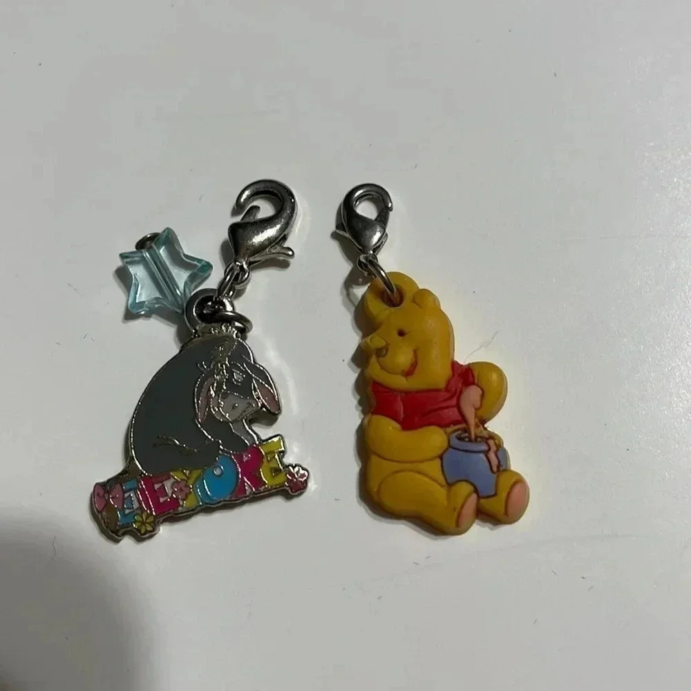 Winnie the Pooh and Eeyore charms
